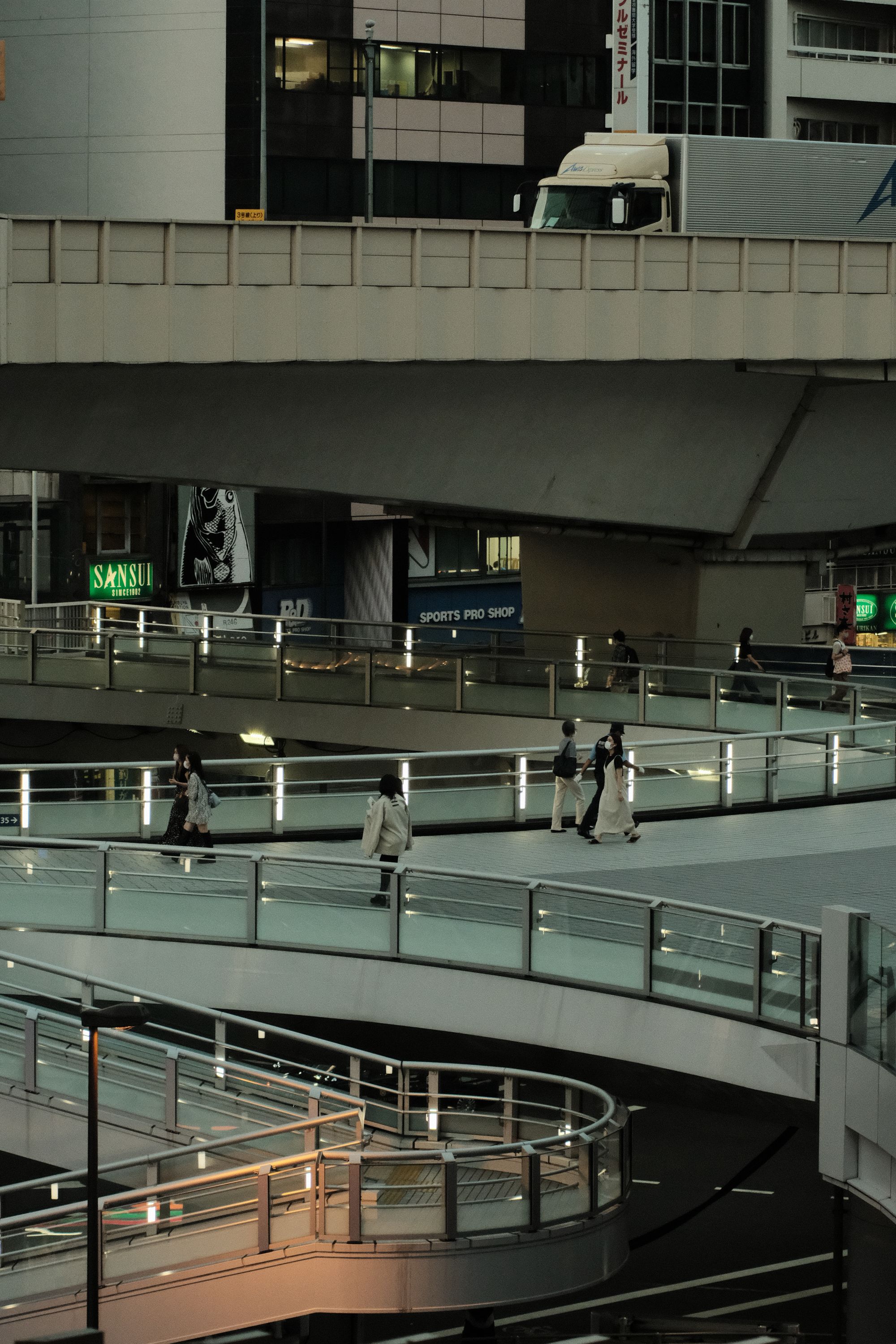 pedestrian bridge in shibuya, tokyo