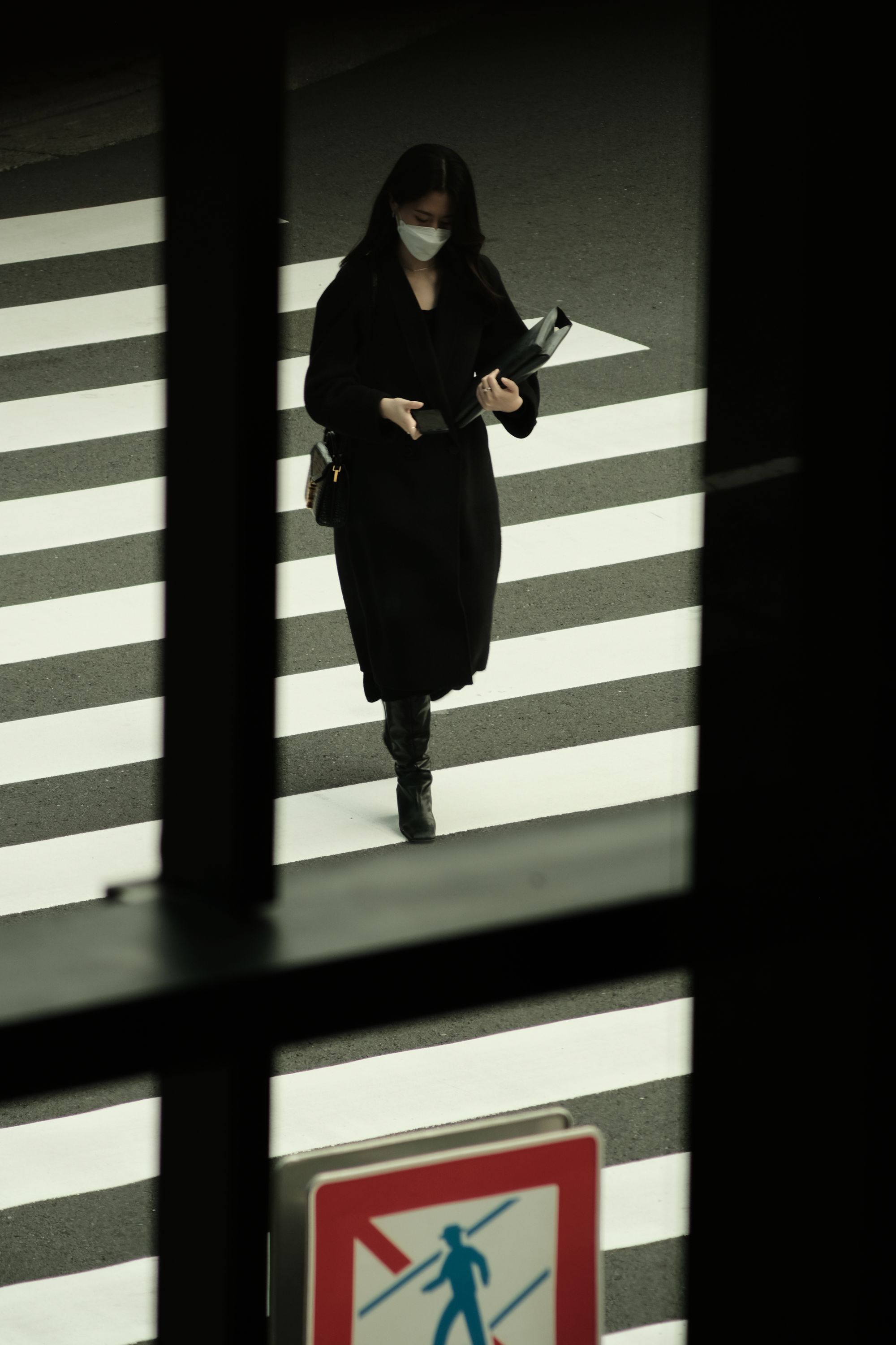 Japanese woman crossing the street