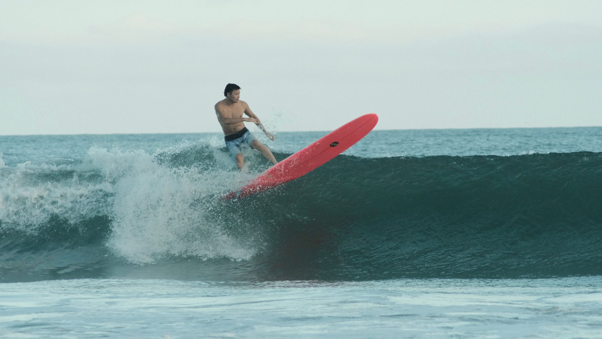 Surfing at golden hour in Onjuku, Japan