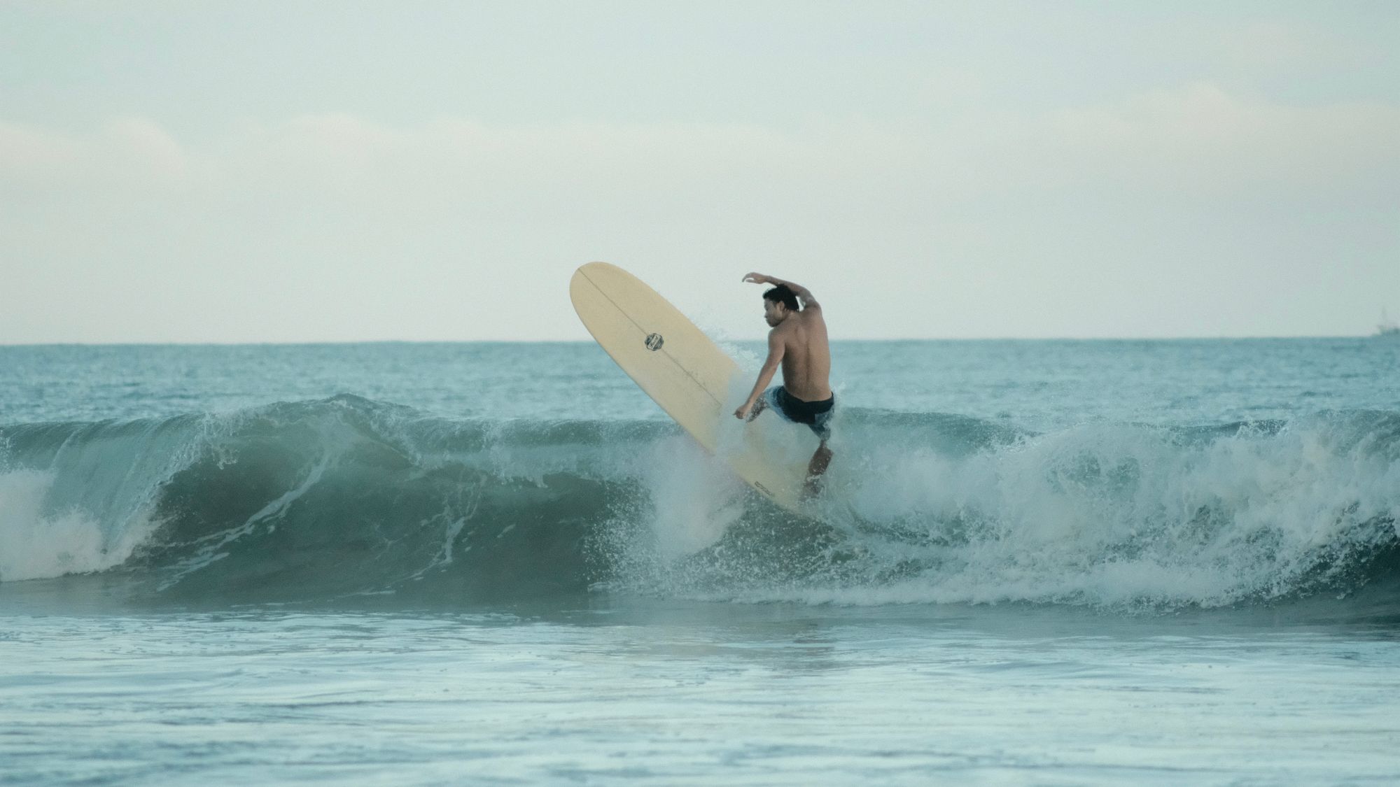 Surfing at golden hour in Onjuku, Japan