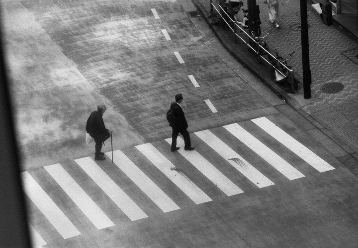 Japanese people crossing a street in tokyo, shot on ilford hp5