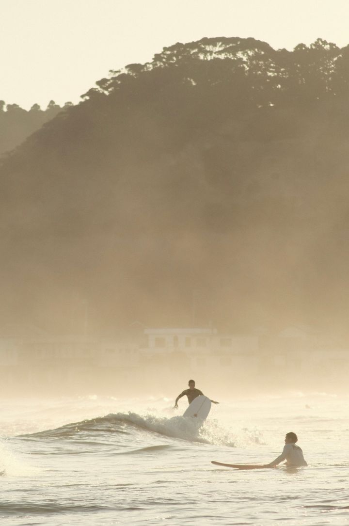 Surfing at golden hour in Onjuku, Japan